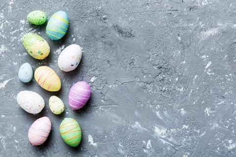 Decorative easter eggs on colored background. easter eggs collection top view Stock Photos