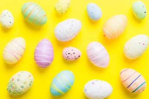Decorative easter eggs on colored background. easter eggs collection top view Stock Photos