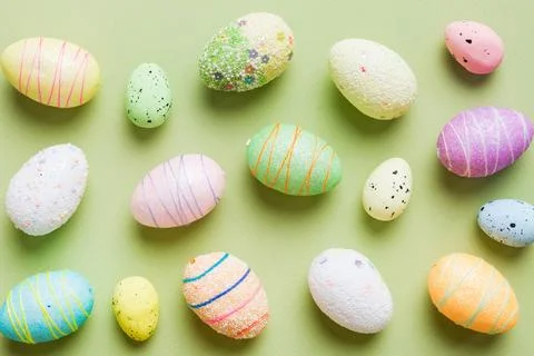 Decorative easter eggs on colored background. easter eggs collection top view Stock Photos