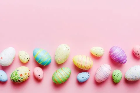 Decorative easter eggs on colored background. easter eggs collection top view Stock Photos