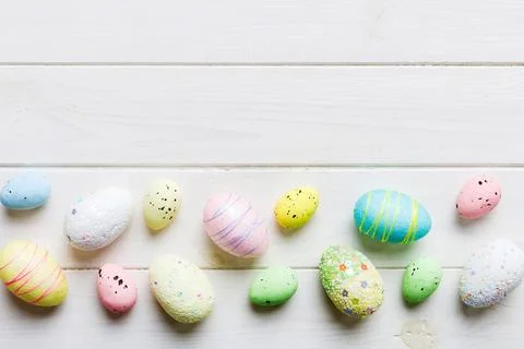 Decorative easter eggs on colored background. easter eggs collection top view Stock Photos