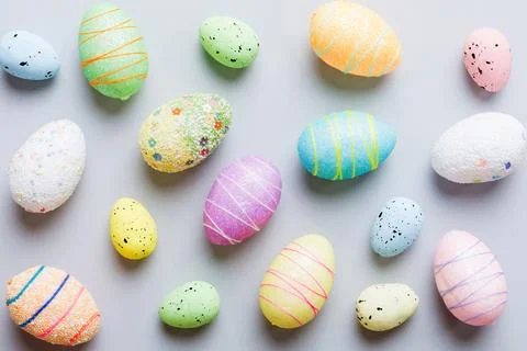 Decorative easter eggs on colored background. easter eggs collection top view Stock Photos