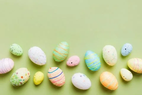 Decorative easter eggs on colored background. easter eggs collection top view Stock Photos