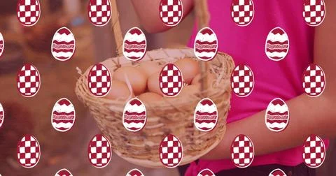 Decorative easter eggs in seamless pattern against woman holding basket full of Fotos de archivo