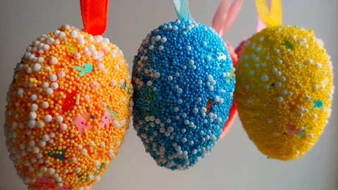 Decorative Easter eggs sway, white background Stock Footage 105926156