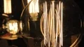 Decorative Edison light bulbs of various shapes and sizes, vintage exhibition HD Footage