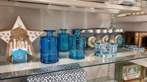 Decorative Eid Items are Displayed on Shelves 스톡 사진