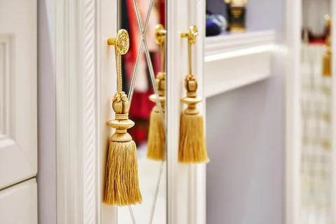 Decorative elements of classic cabinet in wardrobe Stock Photos