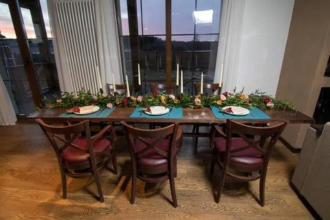Decorative elements, home decorations. Festive table decorations, flowers Stock Photos