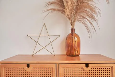 Decorative elements of the interior. with space to copy. Dried spikelets in a Stock Photos