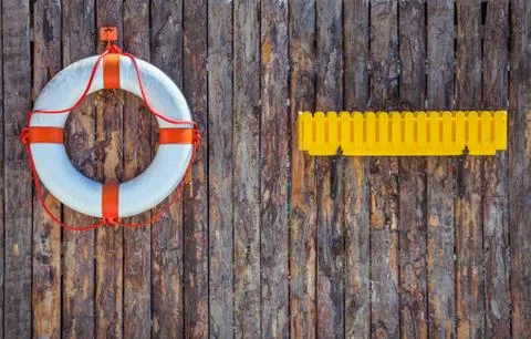 Decorative elements on the marine theme on the background of wooden Stock Photos
