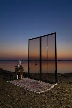 Decorative elements, photo zone with flowers and candles, glass window. 스톡 사진