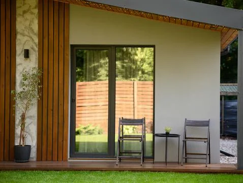 Decorative elements on the summer terrace of the house Stock Photos