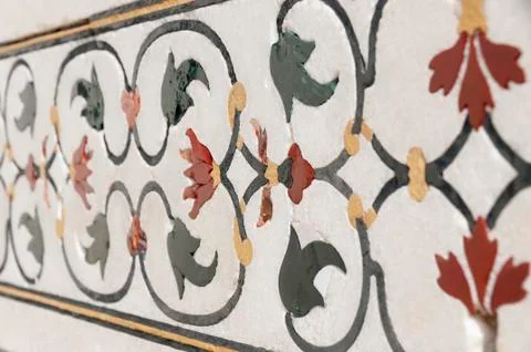 Decorative elements of Taj Mahal created by applying paint, stucco, stone inl Stock Photos