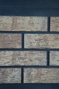 A decorative facing material that imitates brick or stone, which is often u.. Stock Photos