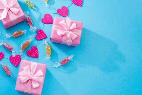 Decorative festive background with gift boxes. Stock Photos