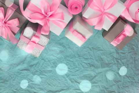 Decorative festive background with gift boxes. Stock Photos