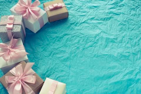 Decorative festive background with gift boxes. Stock Photos