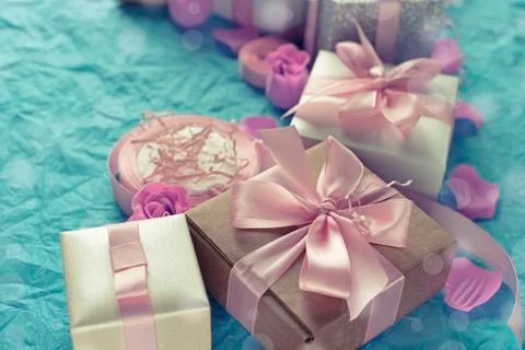 Decorative festive background with gift boxes. Stock Photos