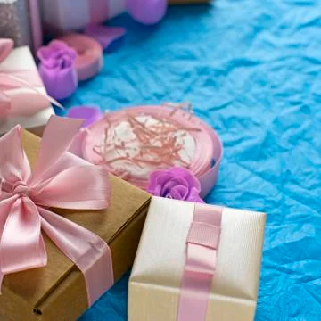 Decorative festive background with gift boxes. Stock Photos