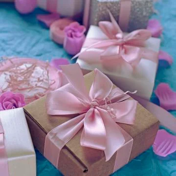 Decorative festive background with gift boxes. Stock Photos