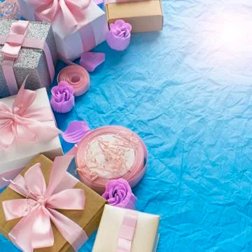 Decorative festive background with gift boxes. Stock Photos
