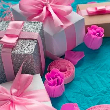 Decorative festive background with gift boxes. Stock Photos