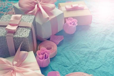 Decorative festive background with gift boxes. Stock Photos