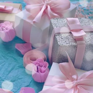 Decorative festive background with gift boxes. Stock Photos
