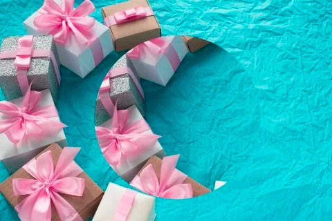 Decorative festive background with gift boxes. Stock Photos