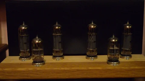 Decorative filament light bulbs switch on by blue light Video stock 127886309