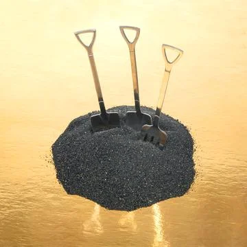 Decorative fork and spoons in the form of shovels on black sand. food tools. Stock Photos