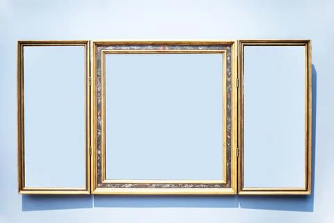 Decorative frame with additional side frames on a blue background. Mockup f.. Stockfoto's