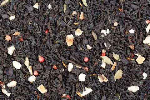 Decorative full frame image of cloves, cardamom, cinnamon,ginger and black tea. Stock Photos