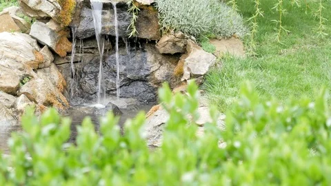 Decorative garden waterfall Stock Footage 76247792