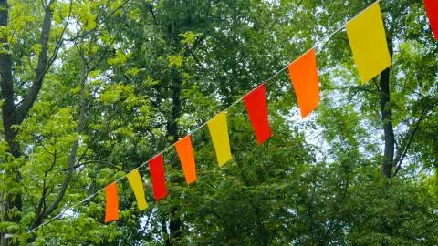 Decorative garlands of colorful rectangular flags Foto stock