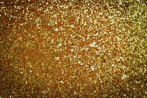 Decorative gold background with sparkling Stock Photos