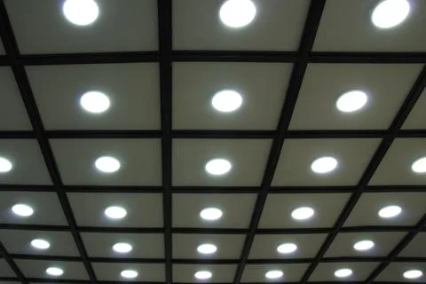 Decorative grid ceiling with LED lighting indoors Stock Photos