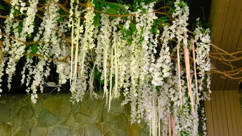 Decorative hanging flowers. Selective focus. Stock Footage 263480839