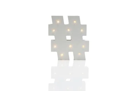 Decorative Hash Symbol with Embedded LED Lights Over White Background Stock Photos