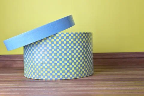 Decorative hatbox on the floor Stock Photos