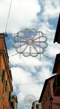 Decorative illuminations set up among the ancient buildings during the 69th p Stock Photos