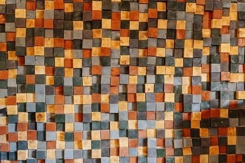 Decorative interior wall made of multi-colored wooden bars. Fotos de archivo