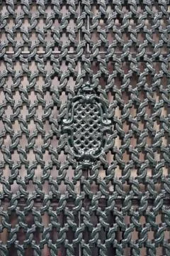 Decorative iron grating on the window Stock Photos