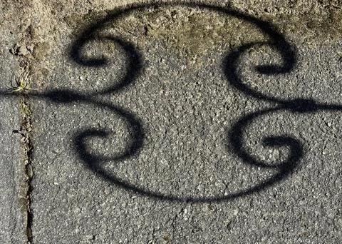 Decorative Ironwork Shadow On Concrete Pavement Stock Photos
