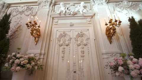 Decorative item made of white plaster on door. Beautiful relief stucco interior Stock Footage 197742043