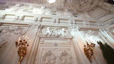 Decorative item made of white plaster on walls. Beautiful relief stucco interior Stock Footage 197742080