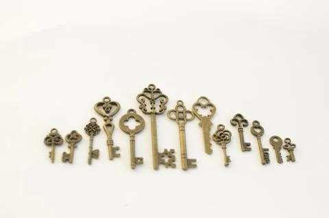 Decorative keys of different sizes, stylized antique. 库存照片