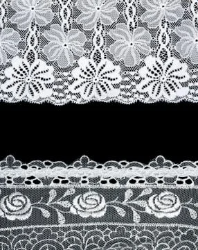 Decorative lace with pattern on black background Stock Photos