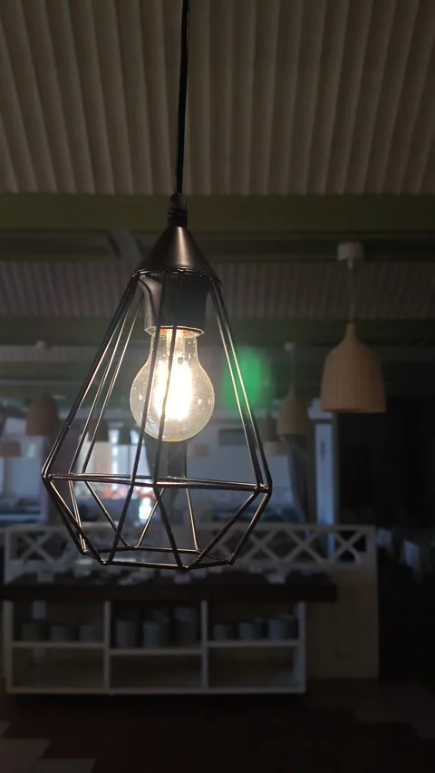 A decorative lamp sways smoothly, close-up Stock Footage 330639730